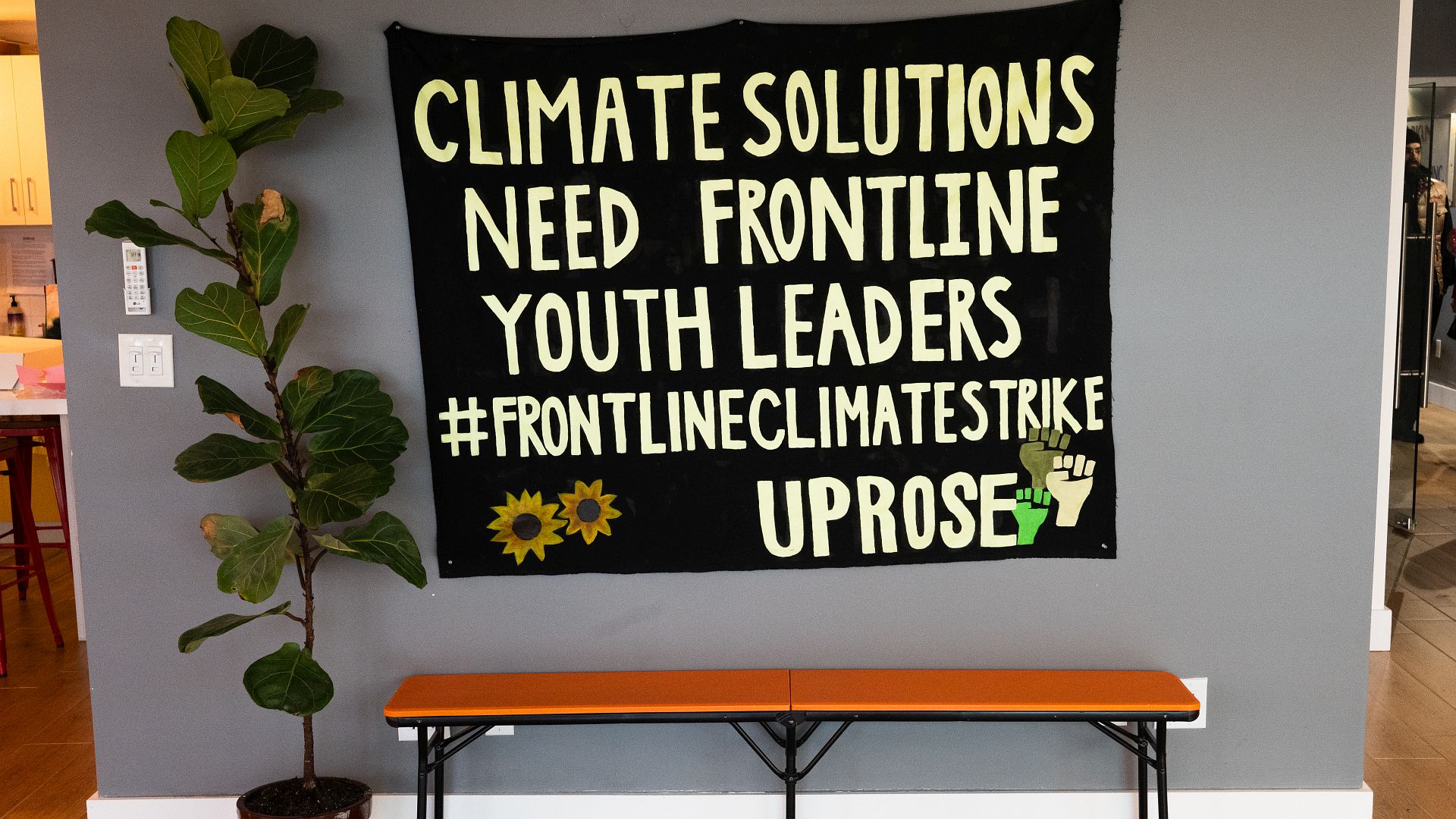 Banner emphasizing the importance of youth leaders at UPROSE