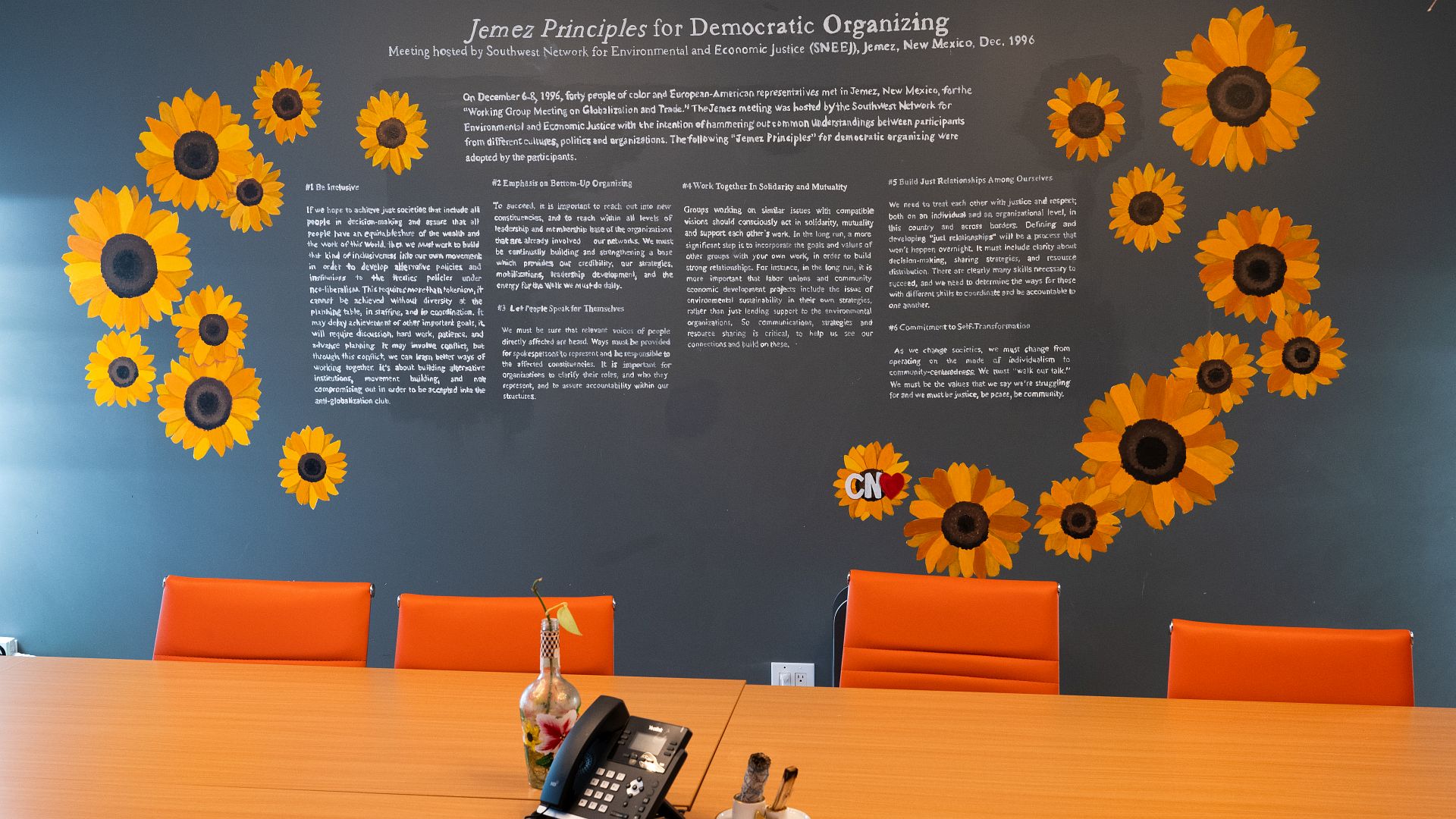 Jemez Principles for Democratic Organizing on the wall of one of UPROSE’s meeting rooms